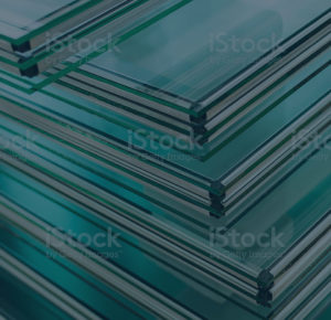 A stack of glass plates stacked on top of each other.
