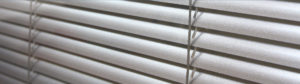 A close up of the blinds on a window
